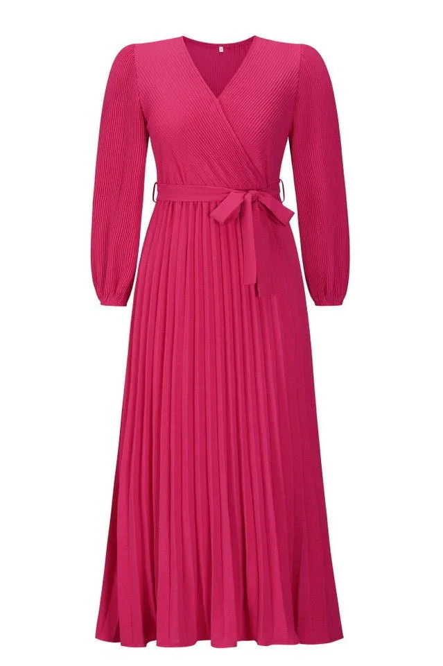 Front view of a pink pleated maxi dress with a v-neck and long sleeves.