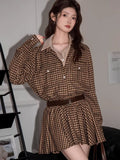 Close-up of the plaid pattern on the shirt dress