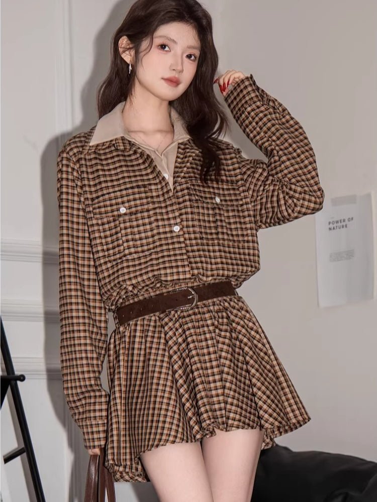 Woman wearing a brown plaid button-down shirt dress with a collared neckline and a belted waist