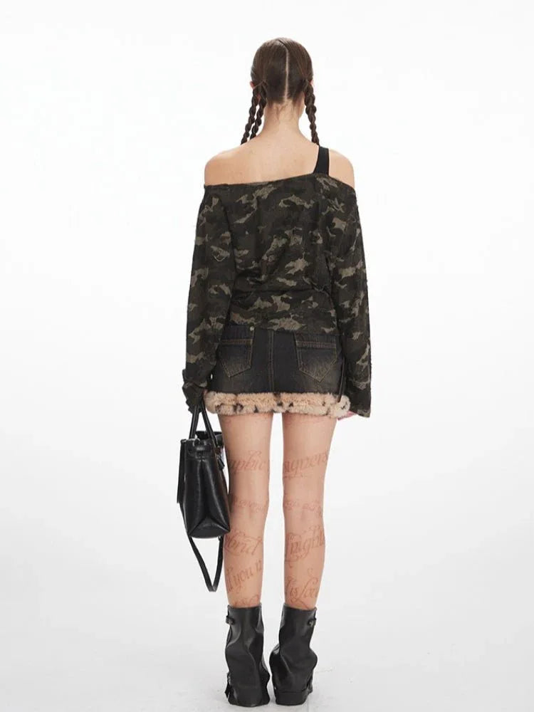 Back view of a woman wearing a camouflage print off-shoulder long sleeve top with a graphic print.